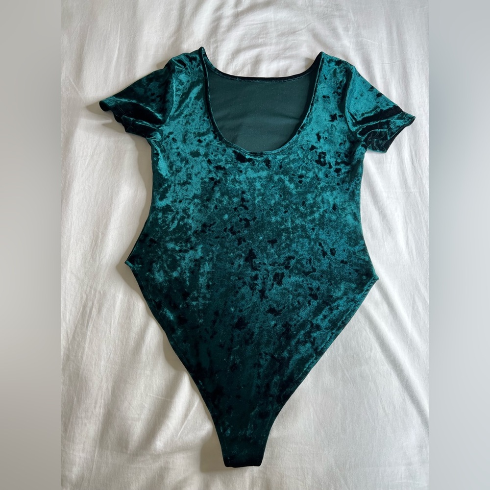 Forever 21 Bodysuit. Forest green velvet material. Classy and elegant.